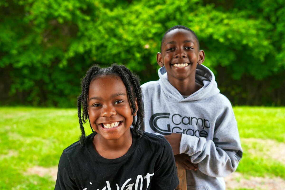 a man and a woman smiling